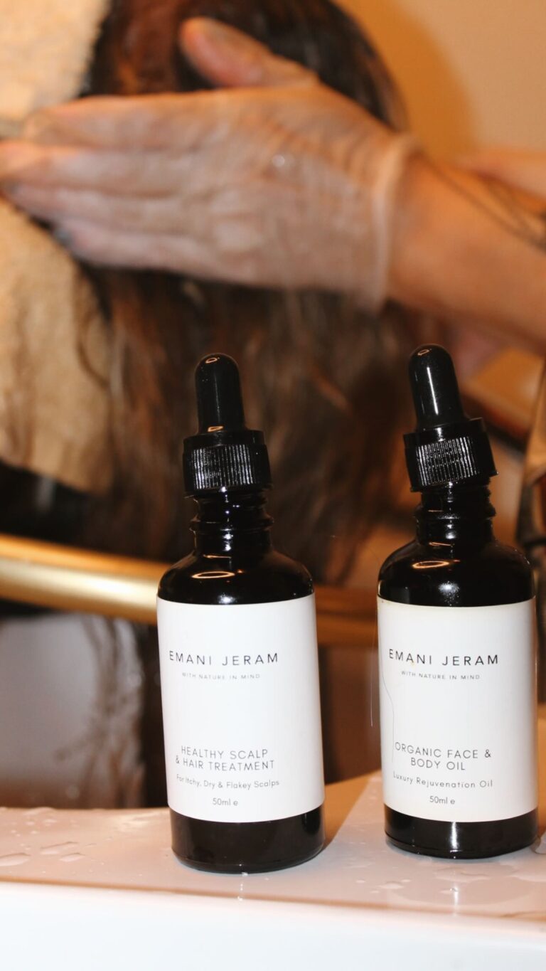 Emani Jeram Healthy Scalp & Hair Treatment and Organic Face & Body Oil in a salon